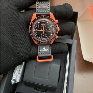 Omega Orange-Cased Chronograph with Black Dial and Strap